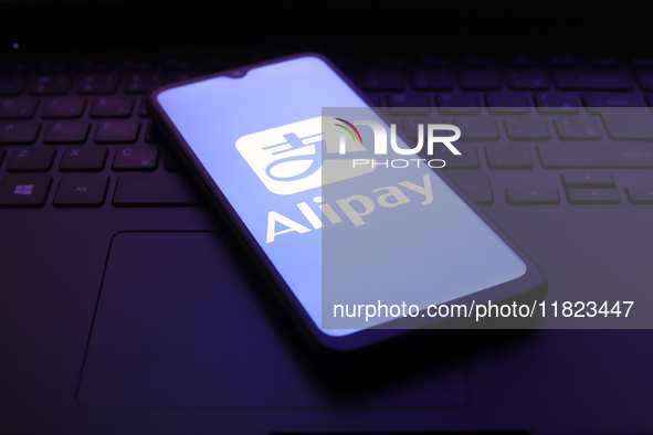 The Alipay logo appears on the screen of a smartphone in Reno, United States, on November 30, 2024. 