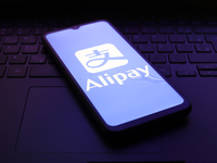 The Alipay logo appears on the screen of a smartphone in Reno, United States, on November 30, 2024. (