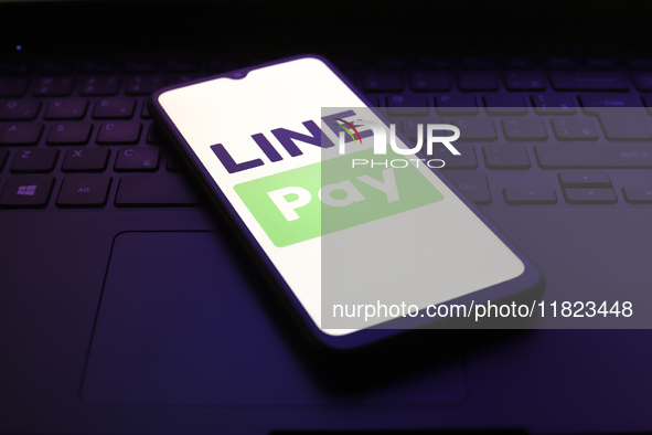 The LINE Pay logo appears on the screen of a smartphone in Reno, United States, on November 30, 2024. 