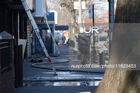 Large fire affects a strip mall in the Rego Park section of Queens, New York, United States on November 30, 2024. Around 11:00 am, Saturday...