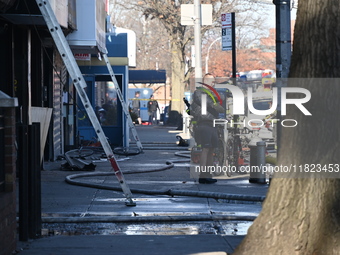 Large fire affects a strip mall in the Rego Park section of Queens, New York, United States on November 30, 2024. Around 11:00 am, Saturday...