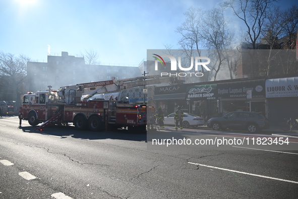 Large fire affects a strip mall in the Rego Park section of Queens, New York, United States on November 30, 2024. Around 11:00 am, Saturday...