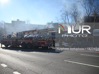 Large fire affects a strip mall in the Rego Park section of Queens, New York, United States on November 30, 2024. Around 11:00 am, Saturday...