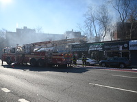 Large fire affects a strip mall in the Rego Park section of Queens, New York, United States on November 30, 2024. Around 11:00 am, Saturday...