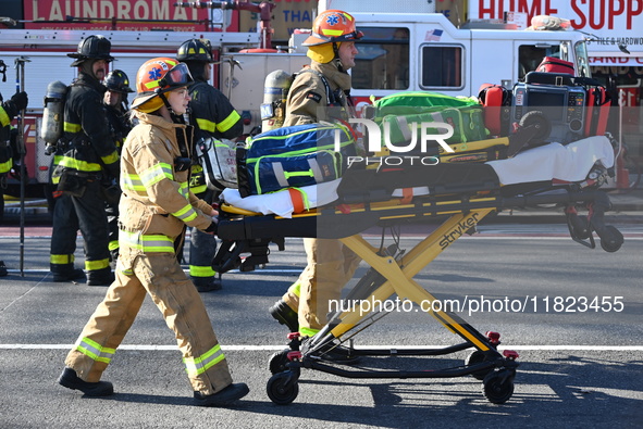 Large fire affects a strip mall in the Rego Park section of Queens, New York, United States on November 30, 2024. Around 11:00 am, Saturday...