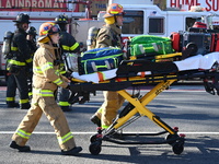 Large fire affects a strip mall in the Rego Park section of Queens, New York, United States on November 30, 2024. Around 11:00 am, Saturday...