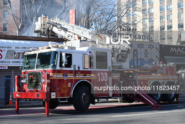 Large fire affects a strip mall in the Rego Park section of Queens, New York, United States on November 30, 2024. Around 11:00 am, Saturday...