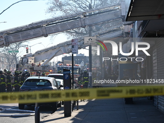 Large fire affects a strip mall in the Rego Park section of Queens, New York, United States on November 30, 2024. Around 11:00 am, Saturday...