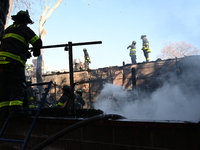 Large fire affects a strip mall in the Rego Park section of Queens, New York, United States on November 30, 2024. Around 11:00 am, Saturday...