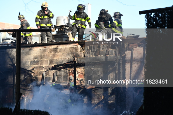 Large fire affects a strip mall in the Rego Park section of Queens, New York, United States on November 30, 2024. Around 11:00 am, Saturday...