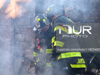 Large fire affects a strip mall in the Rego Park section of Queens, New York, United States on November 30, 2024. Around 11:00 am, Saturday...