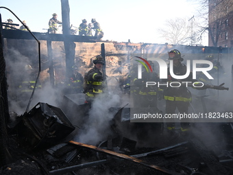 Large fire affects a strip mall in the Rego Park section of Queens, New York, United States on November 30, 2024. Around 11:00 am, Saturday...