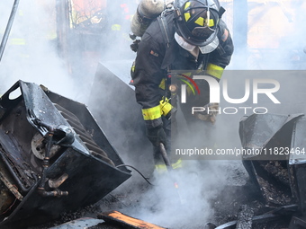 Large fire affects a strip mall in the Rego Park section of Queens, New York, United States on November 30, 2024. Around 11:00 am, Saturday...