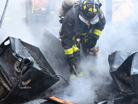 Large fire affects a strip mall in the Rego Park section of Queens, New York, United States on November 30, 2024. Around 11:00 am, Saturday...