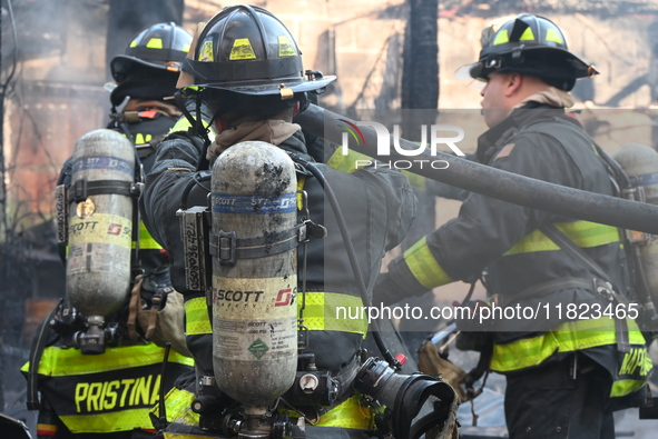 Large fire affects a strip mall in the Rego Park section of Queens, New York, United States on November 30, 2024. Around 11:00 am, Saturday...