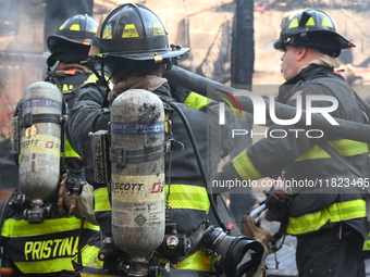 Large fire affects a strip mall in the Rego Park section of Queens, New York, United States on November 30, 2024. Around 11:00 am, Saturday...