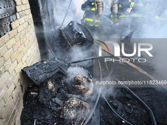 Large fire affects a strip mall in the Rego Park section of Queens, New York, United States on November 30, 2024. Around 11:00 am, Saturday...