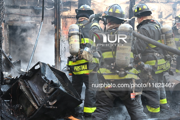 Large fire affects a strip mall in the Rego Park section of Queens, New York, United States on November 30, 2024. Around 11:00 am, Saturday...