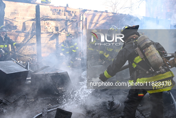 Large fire affects a strip mall in the Rego Park section of Queens, New York, United States on November 30, 2024. Around 11:00 am, Saturday...