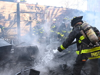 Large fire affects a strip mall in the Rego Park section of Queens, New York, United States on November 30, 2024. Around 11:00 am, Saturday...