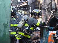 Large fire affects a strip mall in the Rego Park section of Queens, New York, United States on November 30, 2024. Around 11:00 am, Saturday...