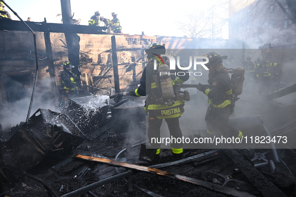 Large fire affects a strip mall in the Rego Park section of Queens, New York, United States on November 30, 2024. Around 11:00 am, Saturday...