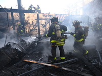 Large fire affects a strip mall in the Rego Park section of Queens, New York, United States on November 30, 2024. Around 11:00 am, Saturday...