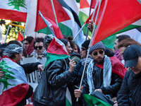 Citizens and activists gather to participate in a demonstration in solidarity with the Palestinian people in Rome, Italy, on November 30, 20...