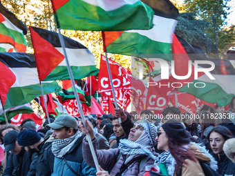 Citizens and activists gather to participate in a demonstration in solidarity with the Palestinian people in Rome, Italy, on November 30, 20...