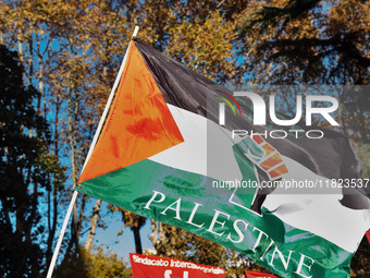 Citizens and activists gather to participate in a demonstration in solidarity with the Palestinian people in Rome, Italy, on November 30, 20...