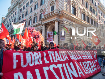 Citizens and activists gather to participate in a demonstration in solidarity with the Palestinian people in Rome, Italy, on November 30, 20...