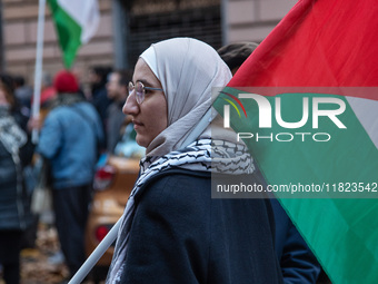 Citizens and activists gather to participate in a demonstration in solidarity with the Palestinian people in Rome, Italy, on November 30, 20...