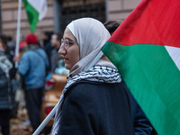 Citizens and activists gather to participate in a demonstration in solidarity with the Palestinian people in Rome, Italy, on November 30, 20...