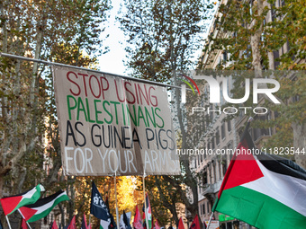 Citizens and activists gather to participate in a demonstration in solidarity with the Palestinian people in Rome, Italy, on November 30, 20...