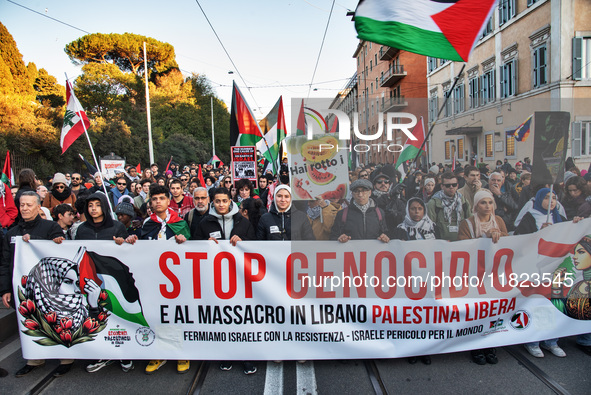 Citizens and activists gather to participate in a demonstration in solidarity with the Palestinian people in Rome, Italy, on November 30, 20...