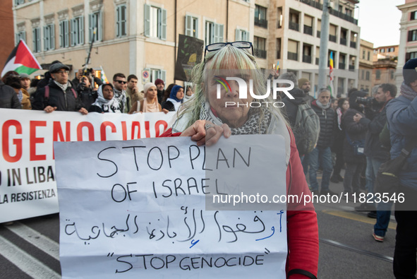 Citizens and activists gather to participate in a demonstration in solidarity with the Palestinian people in Rome, Italy, on November 30, 20...