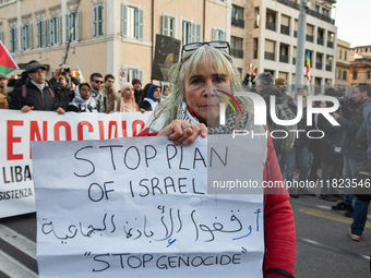 Citizens and activists gather to participate in a demonstration in solidarity with the Palestinian people in Rome, Italy, on November 30, 20...