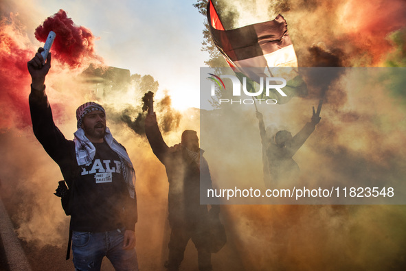 Citizens and activists gather to participate in a demonstration in solidarity with the Palestinian people in Rome, Italy, on November 30, 20...