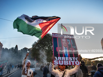 Citizens and activists gather to participate in a demonstration in solidarity with the Palestinian people in Rome, Italy, on November 30, 20...