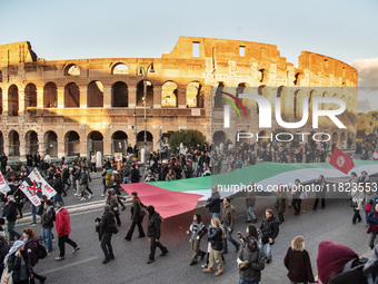 Citizens and activists gather to participate in a demonstration in solidarity with the Palestinian people in Rome, Italy, on November 30, 20...