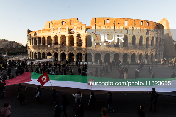 People and various associations participate in a national pro-Palestine demonstration in Rome, Italy, on November 30, 2024, against the geno...