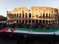 People and various associations participate in a national pro-Palestine demonstration in Rome, Italy, on November 30, 2024, against the geno...