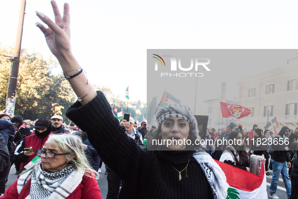 People and various associations participate in a national pro-Palestine demonstration in Rome, Italy, on November 30, 2024, against the geno...