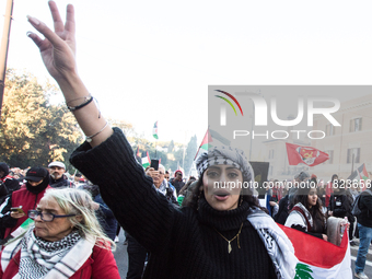 People and various associations participate in a national pro-Palestine demonstration in Rome, Italy, on November 30, 2024, against the geno...