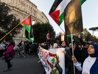 People and various associations participate in a national pro-Palestine demonstration in Rome, Italy, on November 30, 2024, against the geno...