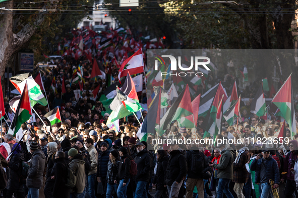 People and various associations participate in a national pro-Palestine demonstration in Rome, Italy, on November 30, 2024, against the geno...