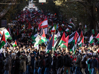 People and various associations participate in a national pro-Palestine demonstration in Rome, Italy, on November 30, 2024, against the geno...