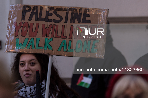 People and various associations participate in a national pro-Palestine demonstration in Rome, Italy, on November 30, 2024, against the geno...