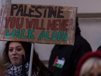 People and various associations participate in a national pro-Palestine demonstration in Rome, Italy, on November 30, 2024, against the geno...