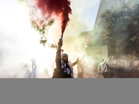 People and various associations participate in a national pro-Palestine demonstration in Rome, Italy, on November 30, 2024, against the geno...